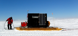 Scientist with sled and radar.